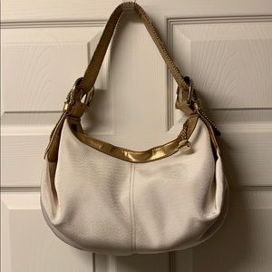 Kathy Van Zeeland Ivory Hand bag with gold trim